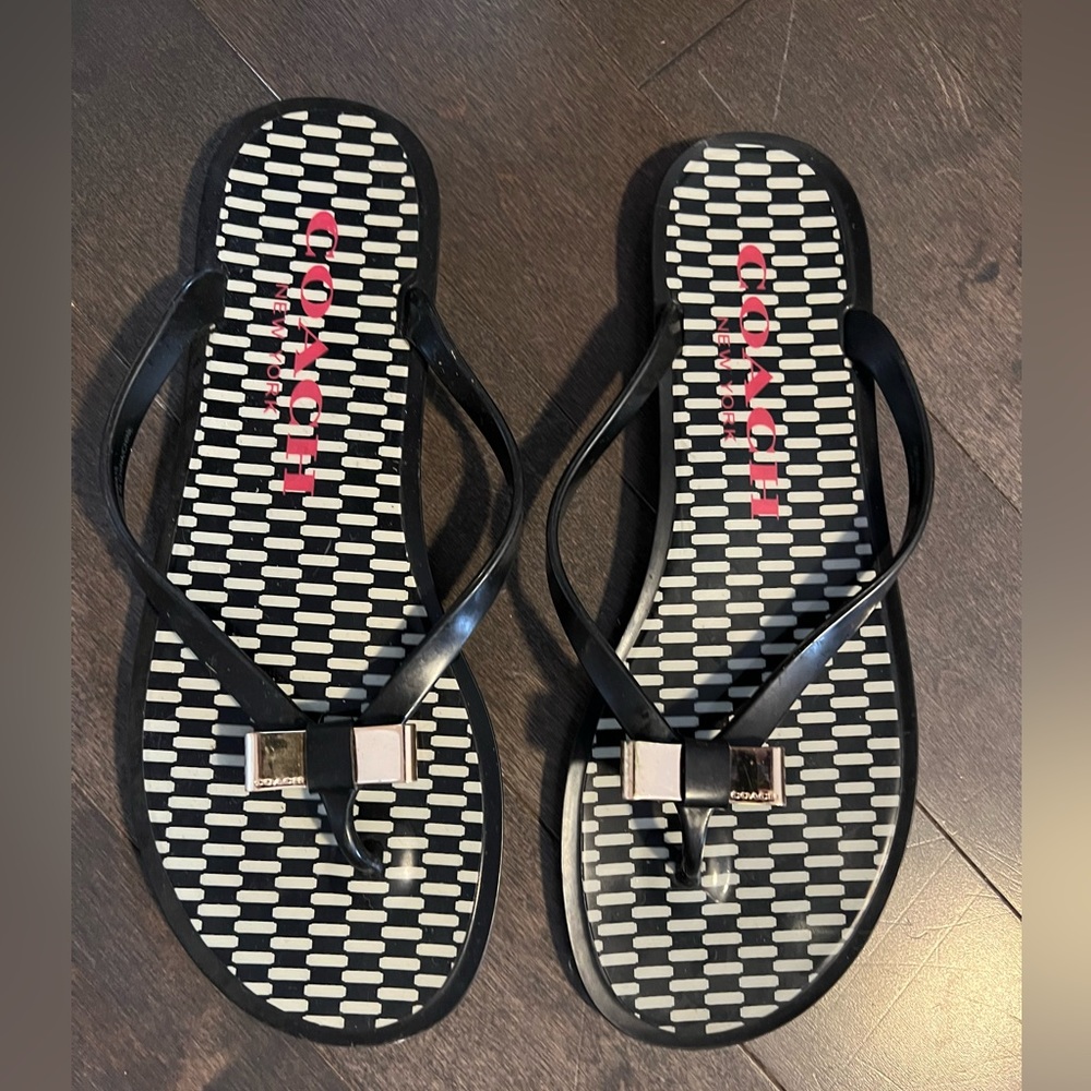 Coach flip flops.